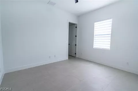 Bedroom - 1142 Eclipse St E, Lehigh Acres, FL 33974 photo 4 of 11