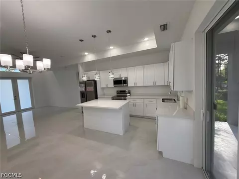 Kitchen - 745 Manuel St E, Lehigh Acres, FL 33974 photo 2 of 5