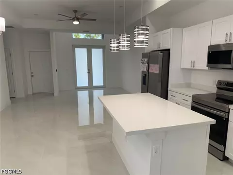 Kitchen - 745 Manuel St E, Lehigh Acres, FL 33974 photo 4 of 5
