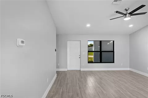 Living - 1055 Pluto Ct, Labelle, FL 33935 photo 6 of 7