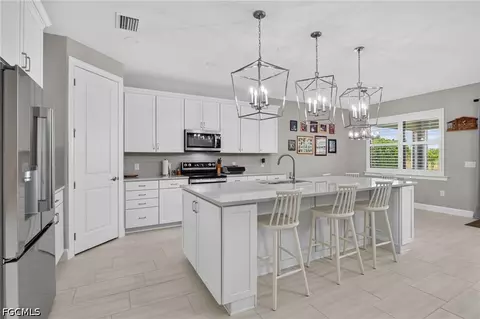 Kitchen - 17624 Kinzie Ln, Estero, FL 33928 photo 1 of 2