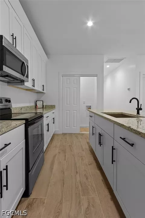Kitchen - 2008 Robert Ave, Alva, FL 33920 photo 5 of 7