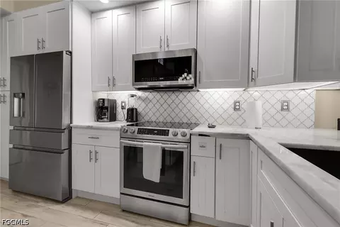 Kitchen - 4199 Jace Ct, Estero, FL 33928 photo 4 of 5