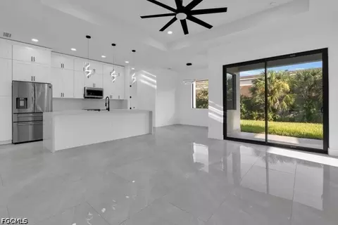 Living - 2204 E 7th St, Lehigh Acres, FL 33936 photo 2 of 3