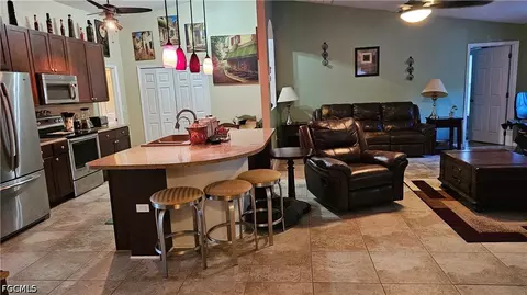 Kitchen - 711 Epps Brown St E, Lehigh Acres, FL 33974 photo 1 of 2