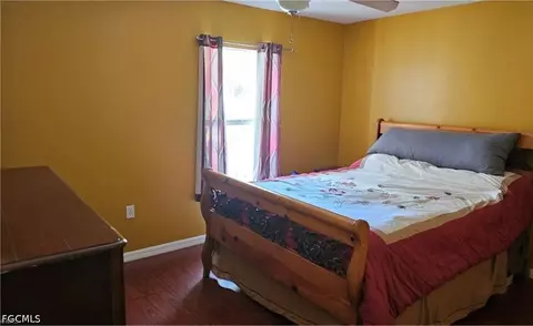 Bedroom - 711 Epps Brown St E, Lehigh Acres, FL 33974 photo 3 of 5