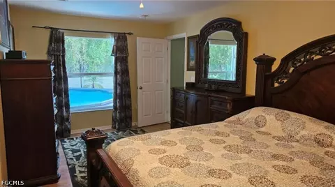 Bedroom - 711 Epps Brown St E, Lehigh Acres, FL 33974 photo 1 of 5