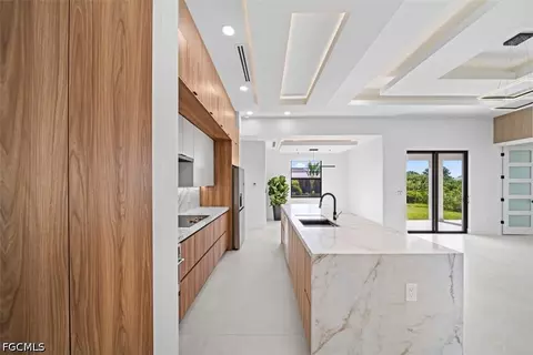 Kitchen - 516 Croydon Ave S, Lehigh Acres, FL 33974 photo 3 of 5