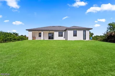 Exterior - 516 Croydon Ave S, Lehigh Acres, FL 33974 photo 3 of 5