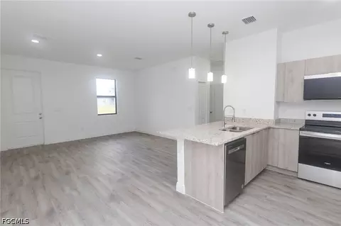 Living - 8038 Rolling Cir, Labelle, FL 33935 photo 1 of 2