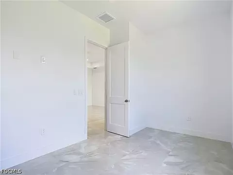 Bedroom - 105 Ruby Ave N, Lehigh Acres, FL 33971 photo 2 of 9