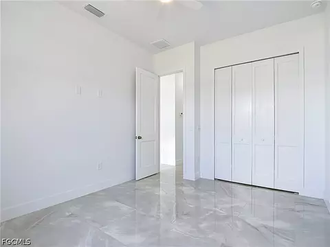 Bedroom - 105 Ruby Ave N, Lehigh Acres, FL 33971 photo 9 of 9