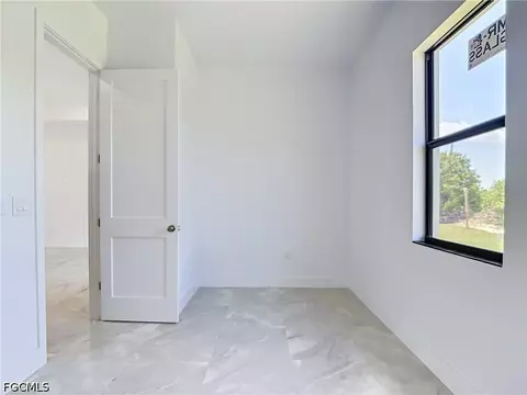 Bedroom - 105 Ruby Ave N, Lehigh Acres, FL 33971 photo 1 of 9