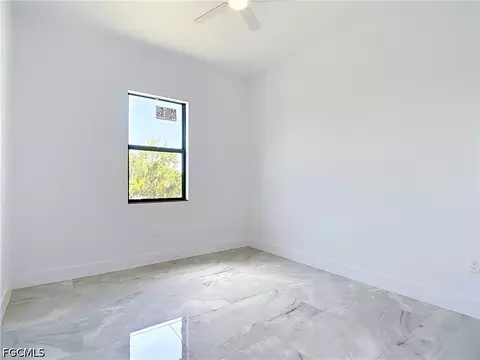 Bedroom - 105 Ruby Ave N, Lehigh Acres, FL 33971 photo 6 of 9