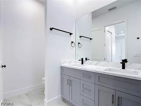 Bath - 105 Ruby Ave N, Lehigh Acres, FL 33971 photo 2 of 4