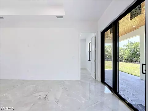 Living - 105 Ruby Ave N, Lehigh Acres, FL 33971 photo 4 of 5