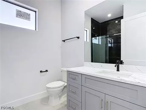 Bath - 105 Ruby Ave N, Lehigh Acres, FL 33971 photo 3 of 4