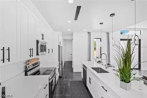 Kitchen - 7717 18th Ter, Labelle, FL 33935 photo 2 of 3