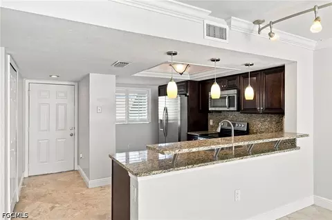 Kitchen - 136 Cypress Way E #4, Naples, FL 34110 photo 3 of 3