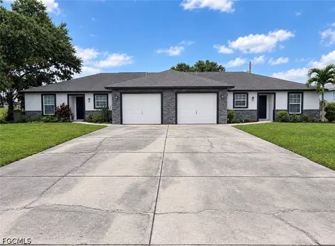 704 706 Gretchen Ave S, Lehigh Acres, FL 33973