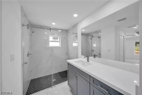 Bath - 1021 Pilgrim St E, Lehigh Acres, FL 33974 photo 1 of 6