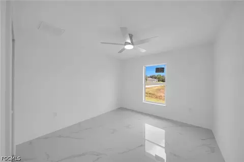 Bedroom - 1021 Pilgrim St E, Lehigh Acres, FL 33974 photo 3 of 3