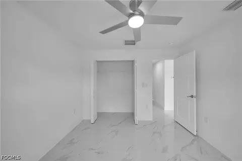 Bedroom - 1021 Pilgrim St E, Lehigh Acres, FL 33974 photo 2 of 3