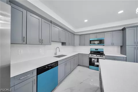 Kitchen - 1021 Pilgrim St E, Lehigh Acres, FL 33974 photo 5 of 5