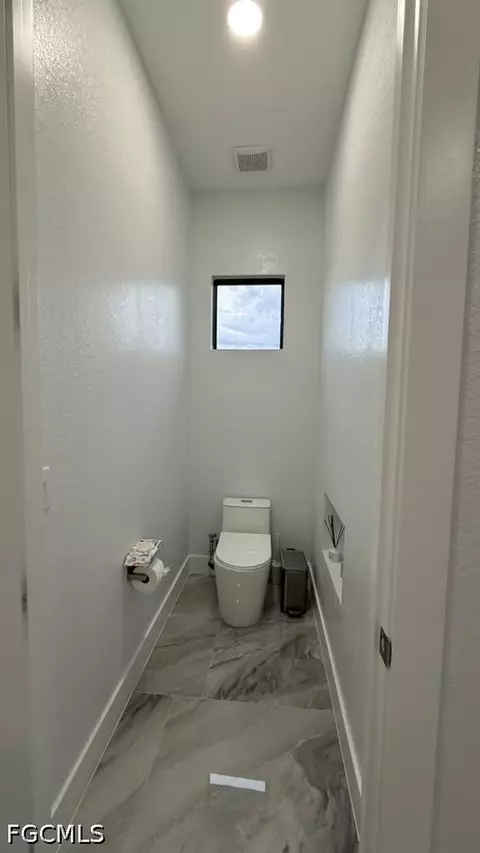 Bath - 7620 23rd Pl, Labelle, FL 33935 photo 1 of 14