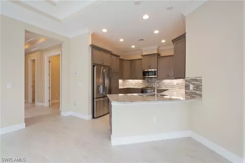 5770 Highbourne Dr, Naples, FL 34113 photo 11