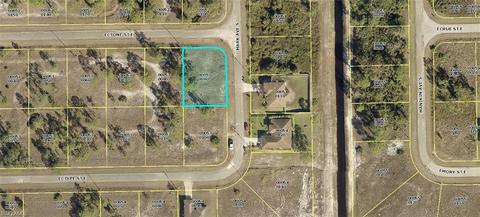 1122 Ectone St E, Lehigh Acres, FL 33974 photo 1