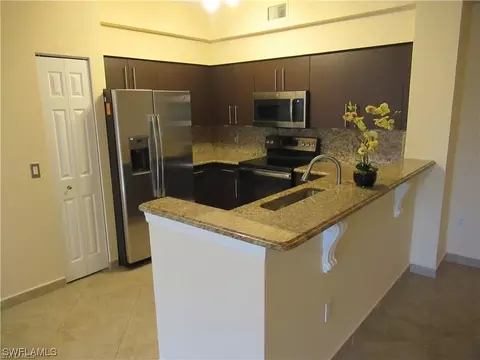 1230 Reserve Way #304, Naples, FL 34105 photo 1