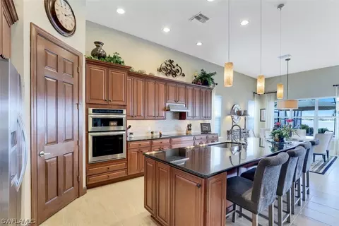 9083 Graphite Cir, Naples, FL 34120 photo 11