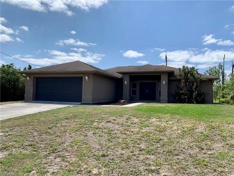1218 Ecclus St E, Lehigh Acres, FL 33974 photo 1