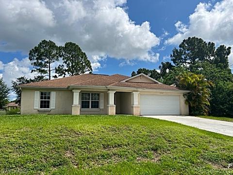 1247 Eclair St E, Lehigh Acres, FL 33974 photo 1