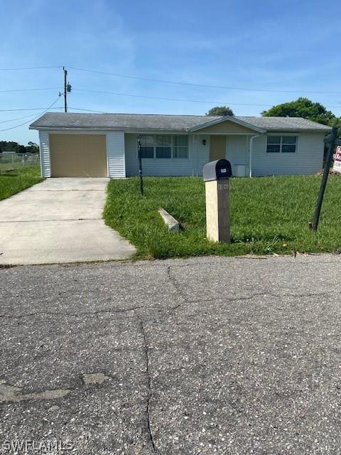 106 W Jasmine Rd, Lehigh Acres, FL 33936