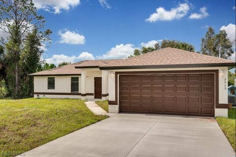 825 Foxtail St, Lehigh Acres, FL 33974 photo 1