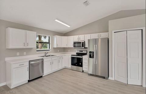 825 Foxtail St, Lehigh Acres, FL 33974 photo 4