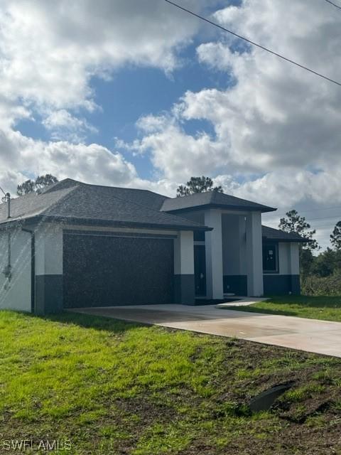 312 Mangonia Ave, Lehigh Acres, FL 33974