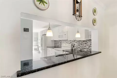 232 Pebble Beach Cir #E103, Naples, FL 34113 photo 11