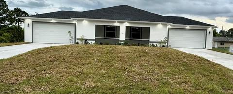 121-123 Gilbert Ave S, Lehigh Acres, FL 33973