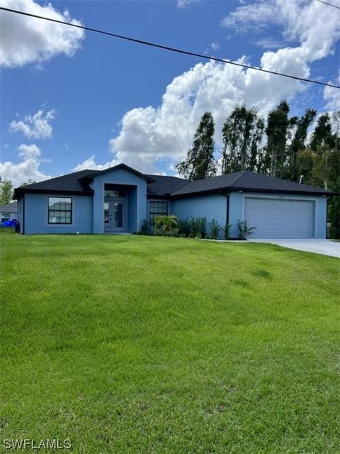 1115 Carl Ave, Lehigh Acres, FL 33971