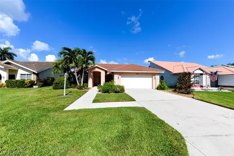 213 Countryside Dr NW, Naples, FL 34104