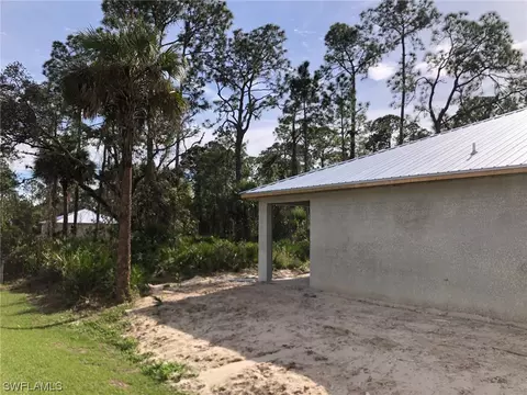 Exterior - 8035 Sandy Cir, Labelle, FL 33935 photo 3 of 11