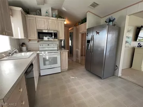 leopard ln #389, Naples, FL 34114 photo 15