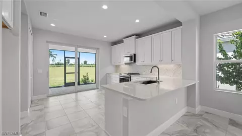 Kitchen - 4641 Centaurus Cir, Naples, FL 34120 photo 2 of 5