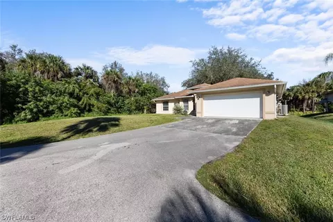 Exterior - 4085 24th Ave SE, Naples, FL 34117 photo 3 of 13