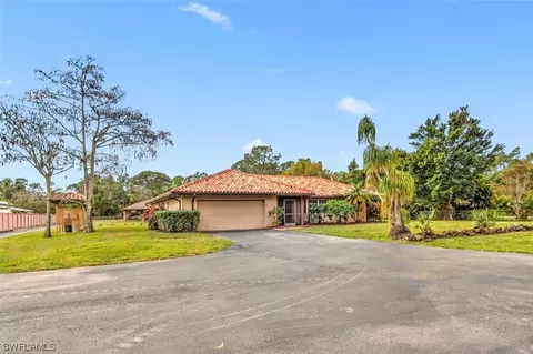 Exterior - 5960 Copper Leaf Ln, Naples, FL 34116 photo 2 of 15