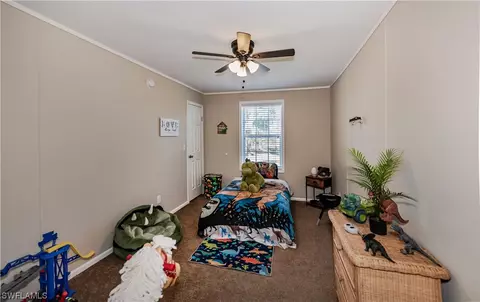 Bedroom - 7897 20th Ter, Labelle, FL 33935 photo 5 of 6