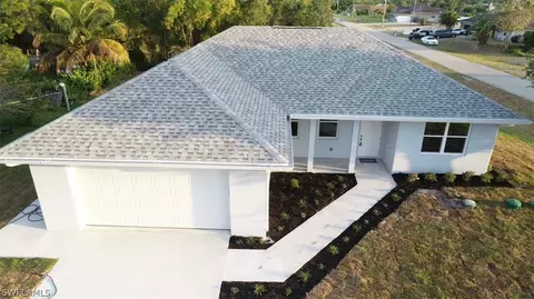 702 Manhattan St E, Lehigh Acres, FL 33974